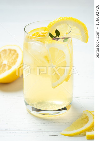 Homemade lemonade with lemon on a white background 136092726
