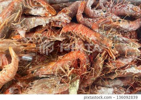 Pile of Frozen Raw Shrimp 136092839