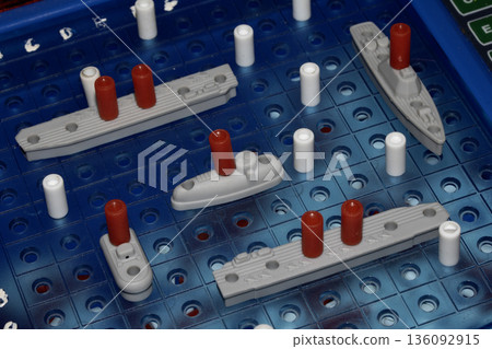 Close up of strategic battleships board game with ships and pegs 136092915