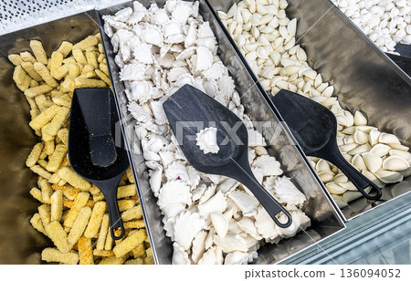 Frozen semi-finished products in a grocery store. A good natural product for fast cooking delicious food Frozen semi-finished products in a grocery store. A good natural product for fast cooking delicious food 136094052