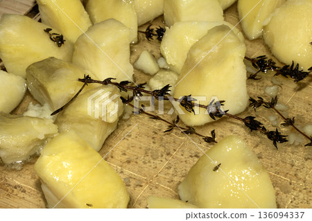 Close up of roast potatoes marinated and seasoned close up 136094337