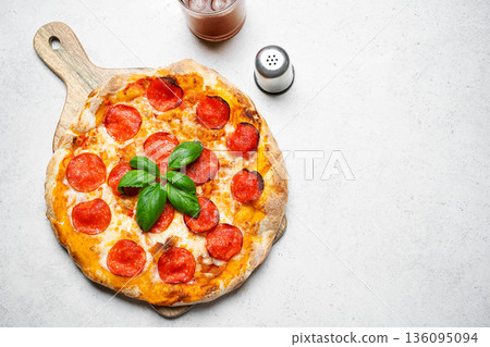 Delicious pepperoni pizza Delicious pepperoni pizza 136095094