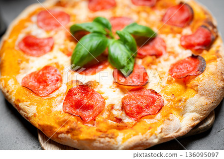 Hot pepperoni pizza Hot pepperoni pizza 136095097