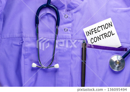 Infection control symbol. Concept words Infection control on beautiful white card. Stethoscope and pen. Beautiful medical uniform. Medical healthy lifestyle infection control concept. Infection control symbol. Concept words Infection control on beautiful white card. Stethoscope and pen. Beautiful medical uniform. Medical healthy lifestyle infection control concept. 136095494