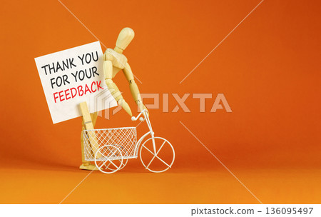 Thank you for your feedback symbol. Concept words Thank you for your feedback on beautiful white paper. Beautiful orange background. Business thank you for your feedback concept. Copy space. 136095497