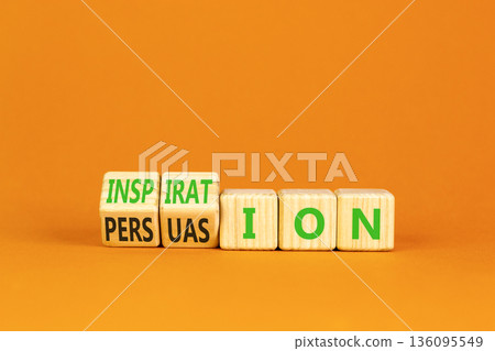 Persuasion or inspiration symbol. Concept words Persuasion and Inspiration on wooden cubes. Beautiful orange background. Psychology persuasion inspiration concept. Copy space. 136095549