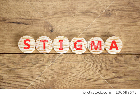 Stigma word symbol. Concept word Stigma on beautiful wooden circles. Beautiful wooden background. Business psychological stigma word concept. Copy space. Stigma word symbol. Concept word Stigma on beautiful wooden circles. Beautiful wooden background. Business psychological stigma word concept. Copy space. 136095573