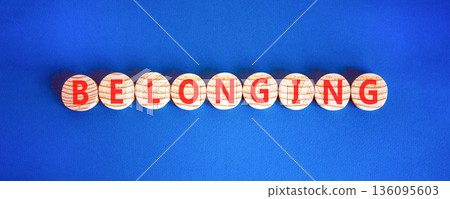 Belonging symbol. Concept words Belonging on beautiful wooden circles. Beautiful blue background. Business support belonging concept. Copy space. Belonging symbol. Concept words Belonging on beautiful wooden circles. Beautiful blue background. Business support belonging concept. Copy space. 136095603