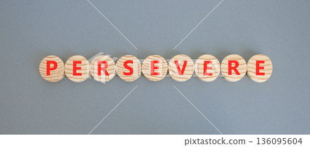 Persevere symbol. Concept word Persevere on beautiful wooden circles. Beautiful grey background. Business education support persevere concept. Copy space. Persevere symbol. Concept word Persevere on beautiful wooden circles. Beautiful grey background. Business education support persevere concept. Copy space. 136095604