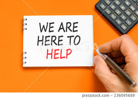 Support, help and we are here to help symbol. Concept words We are here to help on beautiful note. Beautiful orange background. Businessman's hand. Business we are here to help concept. Copy space. Support, help and we are here to help symbol. Concept words We are here to help on beautiful note. Beautiful orange background. Businessman's hand. Business we are here to help concept. Copy space. 136095689