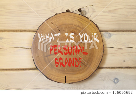 What is your personal brand symbol. Concept words What is your personal brand on beautiful wooden circle. Beautiful wooden wall background. Business what is your personal brand concept. Copy space. 136095692