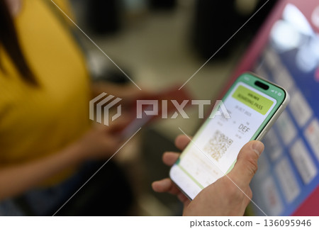 Present your boarding pass on your smartphone. Photo courtesy of Kansai International Airport (KIX) 136095946