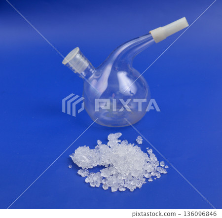 Cadmium nitrate powder on beige background Cadmium nitrate powder on beige background 136096846