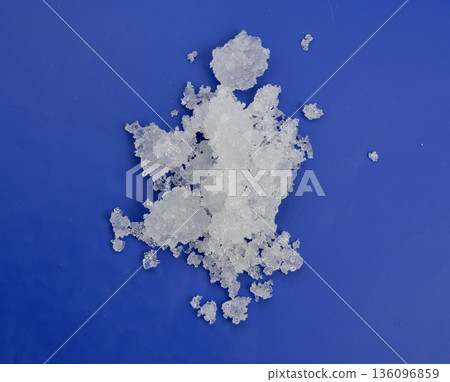 Zinc nitrate on the beige background 136096859