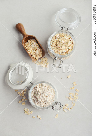 Oat flour in glass jar 136096898