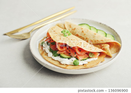 Oatmeal pancakes with slightly salted salmon Oatmeal pancakes with slightly salted salmon 136096900