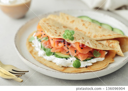 Oatmeal pancakes with slightly salted salmon 136096904