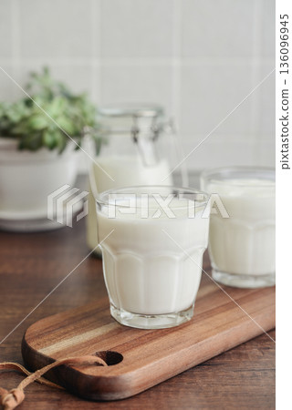 Two glasses of Turkish traditional drink ayran, kefir or buttermilk Two glasses of Turkish traditional drink ayran, kefir or buttermilk 136096945