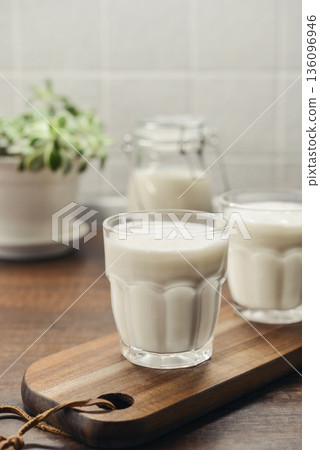 Two glasses of Turkish traditional drink ayran, kefir or buttermilk Two glasses of Turkish traditional drink ayran, kefir or buttermilk 136096946
