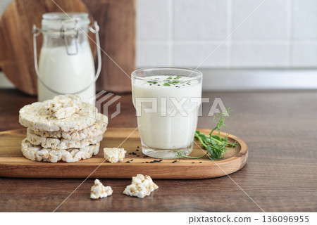 Homemade natural kefir or ayran with rice cakes 136096955