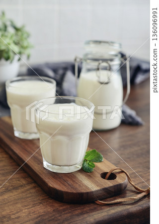 Two glasses of Turkish traditional drink ayran, kefir or buttermilk 136096991
