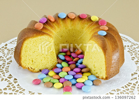 ring-shaped sponge cake and confectionary ring-shaped sponge cake and confectionary 136097262
