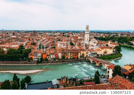 Verona cityscape from Castel San Pietro with the Adige River flowing through. Verona cityscape from Castel San Pietro with the Adige River flowing through. 136097323