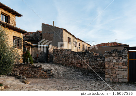 Medinaceli medieval village street with traditional stone house Medinaceli medieval village street with traditional stone house 136097556