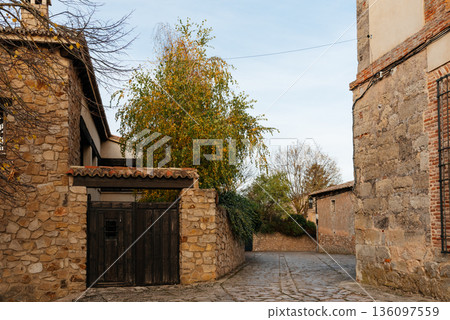 Medinaceli medieval village street with traditional stone house Medinaceli medieval village street with traditional stone house 136097559