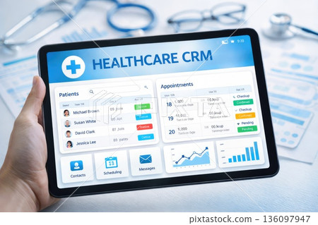 Healthcare CRM Dashboard Interface on Tablet Screen Healthcare CRM Dashboard Interface on Tablet Screen 136097947