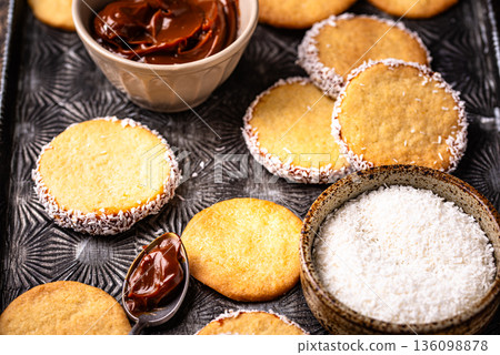 Alfajores, traditional Spanish sandwich cookies Alfajores, traditional Spanish sandwich cookies 136098878