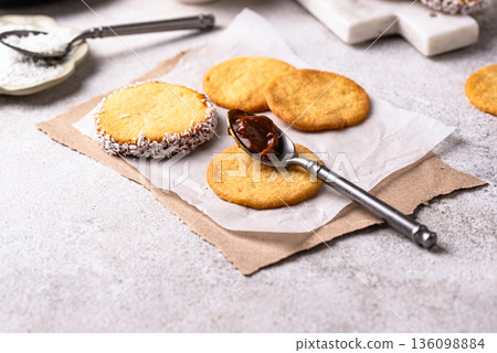 Alfajores, traditional Spanish sandwich cookies Alfajores, traditional Spanish sandwich cookies 136098884
