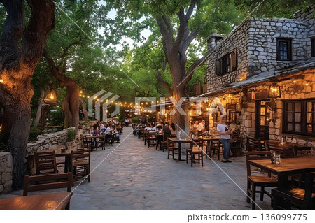 Enchanting Outdoor Restaurant with Stone Building and Twinkling 136099775
