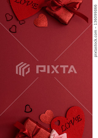 Red Glitter Gift Boxes and Hearts on Festive Background for Valentines Day Celebration 136099866