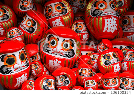 Symbol of determination, good luck charm in Japanese, Many traditional red Daruma doll at Katsuo-ji temple, Osaka, Japan. 136100334