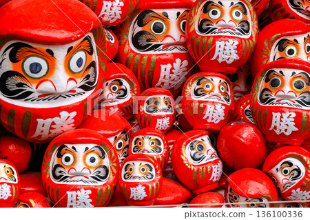 Symbol of determination, good luck charm in Japanese, Many traditional red Daruma doll at Katsuo-ji temple, Osaka, Japan. 136100336