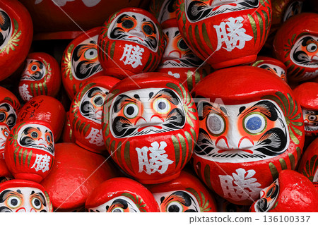 Symbol of determination, good luck charm in Japanese, Many traditional red Daruma doll at Katsuo-ji temple, Osaka, Japan. 136100337