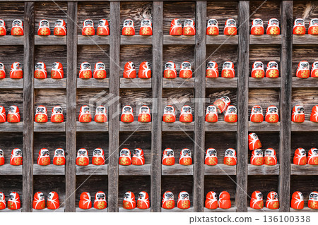 Symbol of determination, good luck charm in Japanese, Many traditional red Daruma doll at Katsuo-ji temple, Osaka, Japan. 136100338