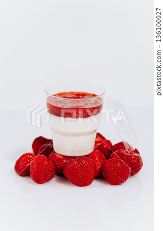 Strawberry panna cotta in cup with fresh berries on white background 136100927