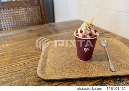 Parfait topped with strawberries Parfait topped with strawberries 136101481