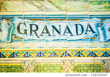Granada sign over a mosaic wall 136103097