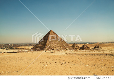 Panoramic View of the Great Pyramids Rising Above Egyptian Desert 136103538