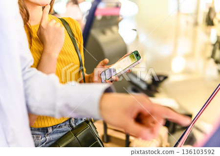 Present your smartphone at check-in. Photo courtesy of Kansai International Airport (KIX). 136103592