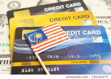 Credit card model with Malaysia flag, financial investment economy business banking. Credit card model with Malaysia flag, financial investment economy business banking. 136104277