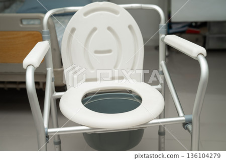 Flush toilet and shower chair in bathroom for old elder people. Flush toilet and shower chair in bathroom for old elder people. 136104279