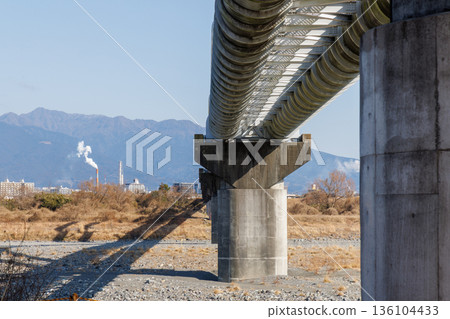 Piers and piping of the Fuji River Aqueduct Bridge (low angle) Piers and piping of the Fuji River Aqueduct Bridge (low angle) 136104433