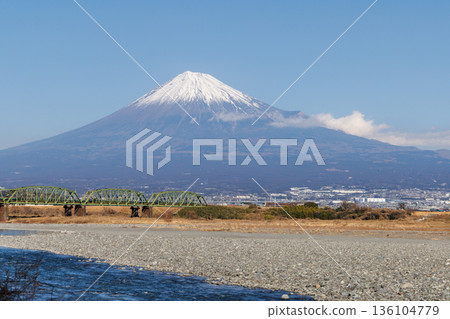 The Tokaido Line crossing the Fuji River and snow-capped Mount Fuji 136104779