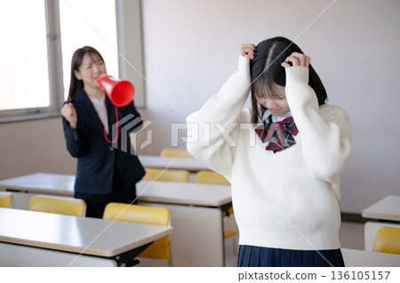 Student holding his head 136105157