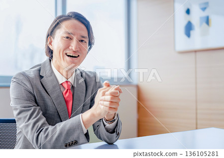 Businessmen who hold hands together Businessmen who hold hands together 136105281