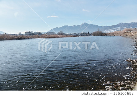 The blue surface of the Chikuma River on a clear winter morning 136105692